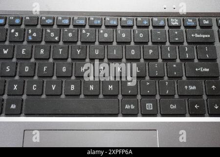 Terengganu, Malaysia - 23 August 2024 : Closeup of black grey keyboard laptop texture Stock Photo