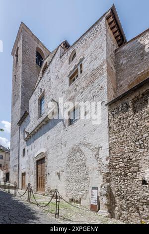 cityscape with San Domenico church facade and bell tower at hilltop historical little town, shot  in bright  summer light at Narni, Umbria, Italy Stock Photo