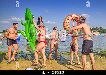 Camping guests of the multi-day Solor Festival enjoy themselves on the  beach of the Maasplassen in Roermond. Solar Festival is one of the most  creative multi-day festivals in the Netherlands. In addition