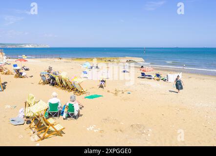 Shanklin Isle of Wight UK - Shanklin beach with people on the sandy beach with deckchairs Shanklin Esplanade Isle of Wight England UK GB Stock Photo