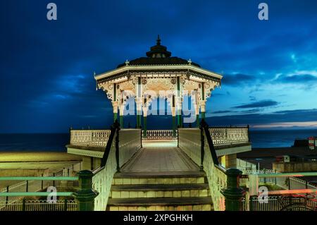 Brighton Bandstand on seafront at dusk, considered to be one of the finest surviving Victorian bandstands, Brighton and Hove, East Sussex, England, UK Stock Photo