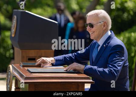 President Joe Biden signs an Executive Order “Revitalizing Our Nation’s Commitment to Environmental Justice for All”, Friday, April 21, 2023, in the Rose Garden of the White House. (Official White House Photo by Adam Schultz) Stock Photo