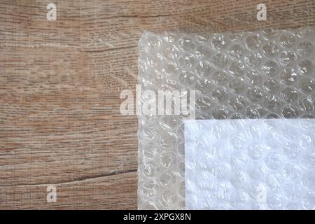 air bubble for absorb delivery covering white book on table Stock Photo