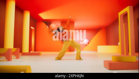 Beautiful Black Woman in Bright Outfit Dancing Energetically in Geometric Abstract Orange, Yellow Environment. Creative Young Female Performing Modern Dance Choreography in a Studio Stock Photo