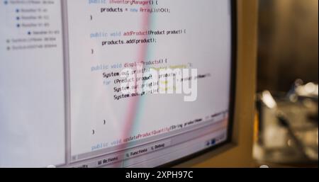 Close Up Shot Of Old Desktop Computer On Work Desk Of Software Developer In Retro Garage. Dated PC Has Operating System Terminal Opened, Prompts Running On Screen, Code Functioning Successfully. Stock Photo