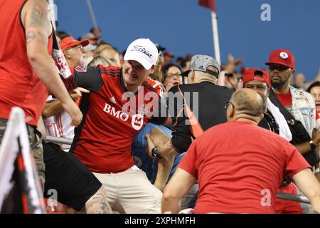 Toronto, ON, Canada, June 19th, 2024, Fight between fans erupted at Major League Soccer game between Toronto FC and Nashville SC at BMO Field. Stock Photo