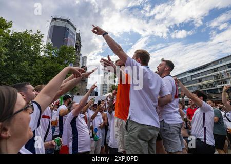 England football fans conregating at Zoologischer Garten ahead of the EURO24 final against Spain in Berlin, Germany Stock Photo