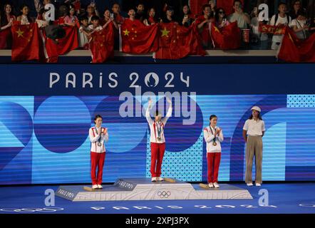 Paris, France. 06th Aug, 2024. Paris Olympics: DIVING - Women's 10 Meter finals - (left to right) Silver medalist Yuxi Chen, gold medalist Hongchan Quan of China and bronze medalist Kim Mi Rae of Korea during the medal Ceremony under a sea of Chinese flags, during day 11 of the Paris Olympic Games 2024 at the Aquatics Centre, Paris, France. Credit: Adam Stoltman/Alamy Live News Stock Photo