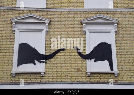 London, UK. 06th Aug, 2024. A new artwork, confirmed to be by Banksy, has been unveiled on a wall of a house in Chelsea. The artwork, depicting a pair of elephants, is the second new artwork in London in two days by the elusive street artist. (Photo by Vuk Valcic/SOPA Images/Sipa USA) Credit: Sipa USA/Alamy Live News Stock Photo