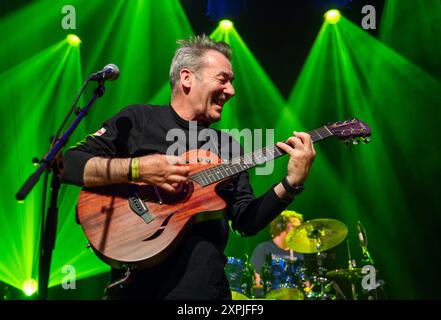 Eddie Lundon, guitarist and singer with the band China Crisis, performing on stage during a live concert in 2024 Stock Photo