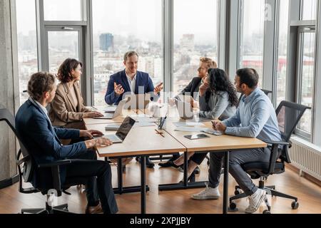 Business Professionals Meeting In Modern Office During Daytime Stock Photo