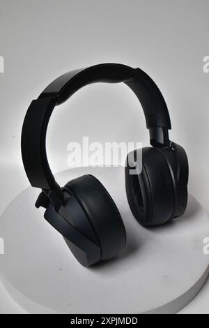 Black headphones with casual model isolated on white Stock Photo