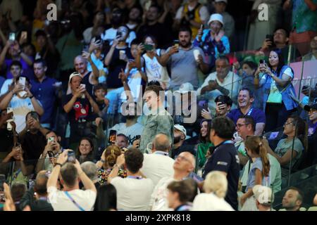 Paris, FRANCE - AUGUST 06: French Gold Medal winning swimmer Léon Marchand watches a Men's basketball quarterfinal game between Team United States and Team Brazil on day eleven of the Olympic Games Paris 2024 at Bercy Arena on August 06, 2024 in Paris, France. © diebilderwelt / Alamy Live News Stock Photo