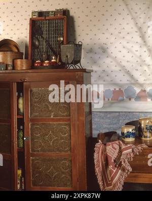 Kitchen with wallpaper, 50's, 60's, 70's, 80's, styled with food, antique accessories Stock Photo