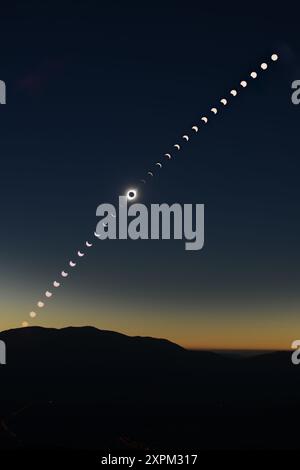 Composite image of the total solar eclipse on 2 July 2019. Venus can be seen as a tiny dot below the fourth picture from the bottom. Photographed from La Higuera, Chile. Stock Photo