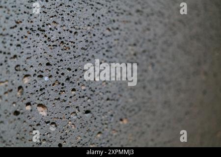 Wallpaper of basalt surface, closeup of photo with selective focus Stock Photo