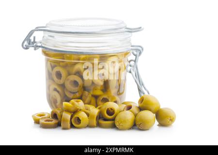 Sliced pickled green olives in brine isolated on a white background. Stock Photo