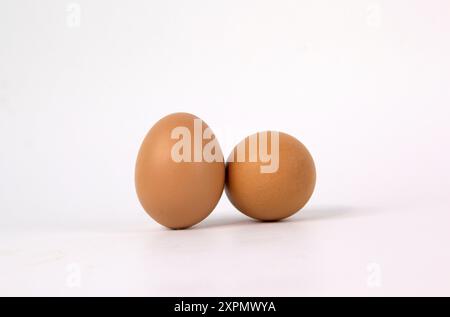 Two eggs isolated on white background Stock Photo