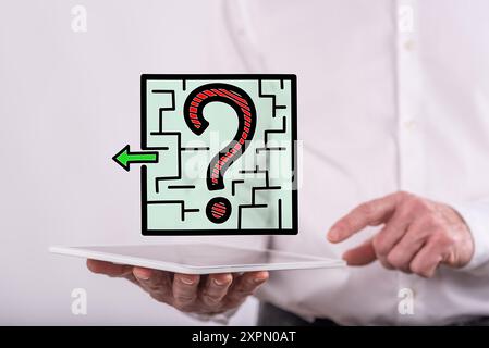 Decision concept above a tablet held by a man in background Stock Photo