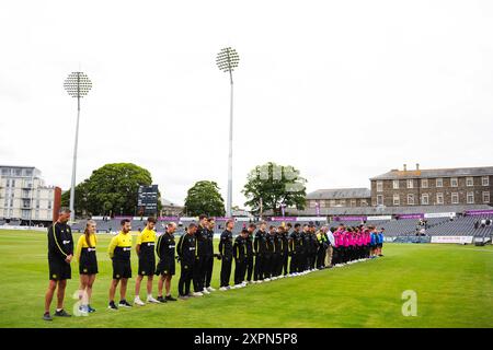 Bristol, UK, 7 August 2024. Gloucestershire and Sussex line up to observe a minutes silence in memory of former Surrey and England batter Graham Thorpe during the Metro Bank One-Day Cup match between Gloucestershire and Sussex Sharks. Credit: Robbie Stephenson/Gloucestershire Cricket/Alamy Live News Stock Photo