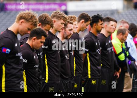 Bristol, UK, 7 August 2024. Gloucestershire line up to observe a minutes silence in memory of former Surrey and England batter Graham Thorpe during the Metro Bank One-Day Cup match between Gloucestershire and Sussex Sharks. Credit: Robbie Stephenson/Gloucestershire Cricket/Alamy Live News Stock Photo