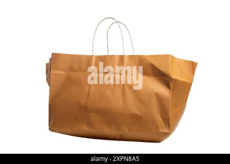 Brown paper bag isolated on white background. Clipping path included. Stock Photo