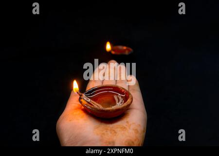 Diwali Celebration and Deepavali Tihar Hindu Festival with Diya Lamp Diyo in Dark Background Stock Photo