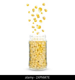 Corns falling into jar on light grey background Stock Photo