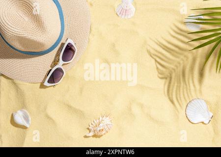 Beautiful seashells on beach sand. Summer vacation background. Stock Photo