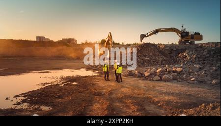Aerial Drone Shot Of Construction Site With Excavators On Sunny Day: Diverse Team of Real Estate Developers Discussing Project. Engineer, Architect, Investor Talking About New Building, Using Tablet. Stock Photo