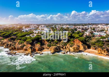 Amazing view from the sky of town Olhos de Agua in Albufeira, Algarve, Portugal. Aerial coastal view of town Olhos de Agua, Albufeira area, Algarve, P Stock Photo