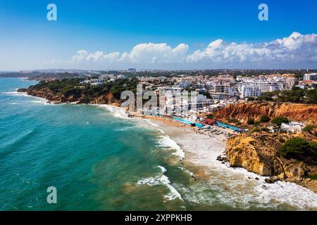 Amazing view from the sky of town Olhos de Agua in Albufeira, Algarve, Portugal. Aerial coastal view of town Olhos de Agua, Albufeira area, Algarve, P Stock Photo