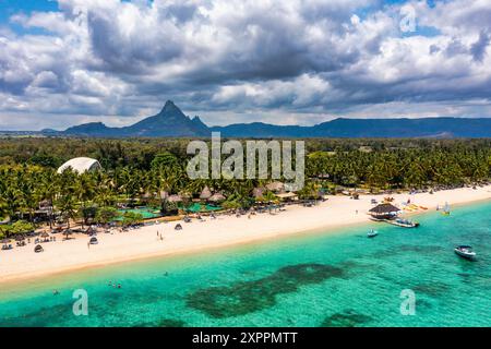 Beach of Flic en Flac with beautiful peaks in the background, Mauritius. Beautiful Mauritius Island with gorgeous beach Flic en Flac, aerial view from Stock Photo