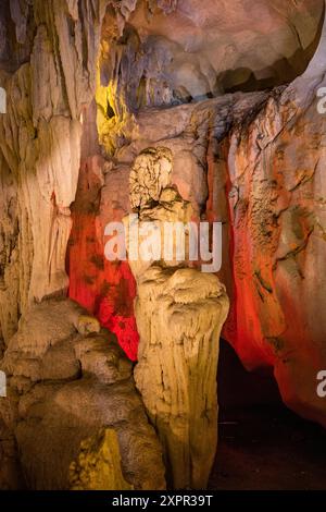 Illuminated stalactites and stalagmites in Trung Trang Cave on Cat Be Island, Lan Ha Bay, Haiphong, Vietnam, Asia Stock Photo