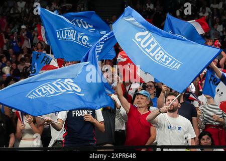 Paris, France. 07th Aug, 2024. French basketball fans wave flags before the start of the Women's Basketball quarterfinals between France and Germany at the Paris 2024 Olympic Games in Paris, France on Wednesday, August 7, 2024. Photo by Richard Ellis/UPI Credit: UPI/Alamy Live News Stock Photo