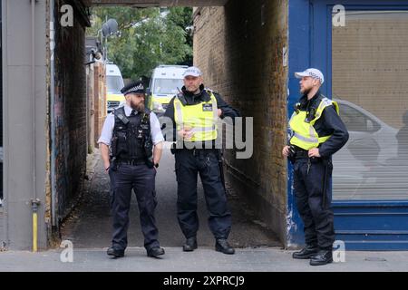 Walthamstow, London, UK. 7th Aug 2024. Far right protests and counter ptotests, a heavy police presence as shops are closed and boarded up in Walthamstow ahead of potential trouble. Credit: Matthew Chattle/Alamy Live News Stock Photo