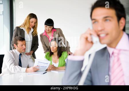 Adult, Adults, Board room, Board rooms, Boardroom, Boardrooms, business, Businessman, Businessmen, Businesspeople, Businessperson, Calling, Caucasian, Stock Photo