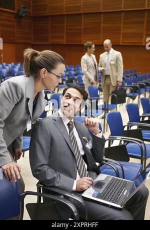 Conventioneers in lecture hall,  convention center,  Kursaal Center. San Sebastian,  Guipuzcoa,  Basque Country,  Spain Stock Photo