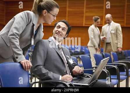 Conventioneers in lecture hall,  convention center,  Kursaal Center. San Sebastian,  Guipuzcoa,  Basque Country,  Spain Stock Photo