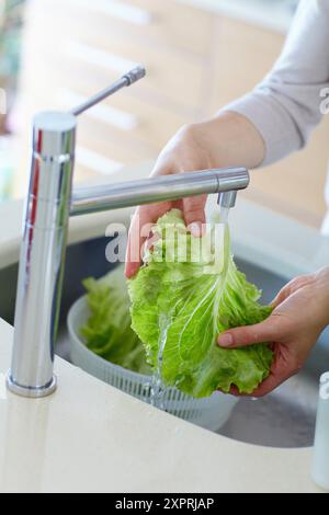 Young couple in kitchen Stock Photo