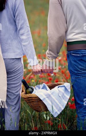 Adult, Adults, Alcohol, Alcoholic drink, Alcoholic drinks, Aliment, Aliments, Back view, Basket, Baskets, Beverage, Beverages, Blue jean, Blue jeans, Stock Photo