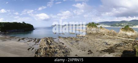 Os Castelos rock formations on beach, Viveiro. Lugo province, Galicia, Spain Stock Photo