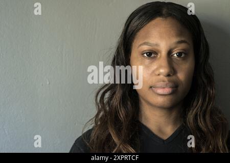 Tilburg, Netherlands, Studio portrait and close up of a dark skinned woman from Africa descent. Stock Photo