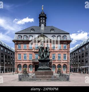 Monument to Wilhelm and Jakob Grimm in front of the town hall on the market square, Hanau, Hesse, Germany Stock Photo