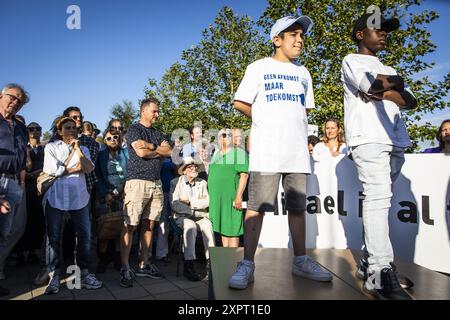 AMSTERDAM - Sympathizers of the Amsterdam boy Mikael and his Armenian mother are participating in a solidarity march for the two, who previously heard that they were not allowed to stay in the Netherlands. ANP DINGENA MOL netherlands out - belgium out Stock Photo