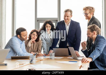 Business Professionals Collaborating on a Project in a Modern Office Stock Photo