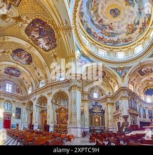 BERGAMO, ITALY - APRIL 7, 2022: Bergamo Cathedral interior with side chapels, wall columns, stunning cupola, Bergamo, Italy Stock Photo