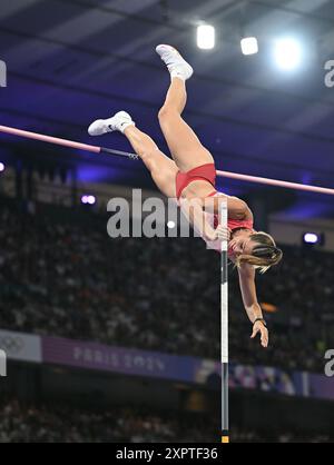 Alysha Newman, of Canada, competes in the women's pole vault final at
