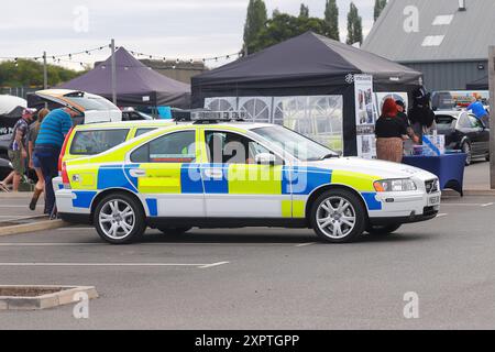 A Volvo S60 T5 police car of South Yorkshire Police Force on show at the Cops & Cars event at The Motorist in Leeds,Yorkshire,UK Stock Photo