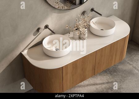 A bathroom with two sinks and a mirror. The sink is white and the mirror is black. The sink is made of wood and the mirror is made of glass Stock Photo